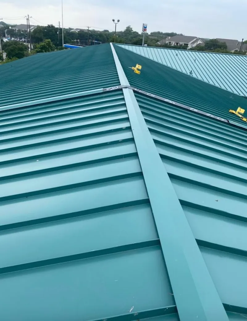 Green commercial metal roof ridge and valley for Metal Roof Repair in South San Jose Hills